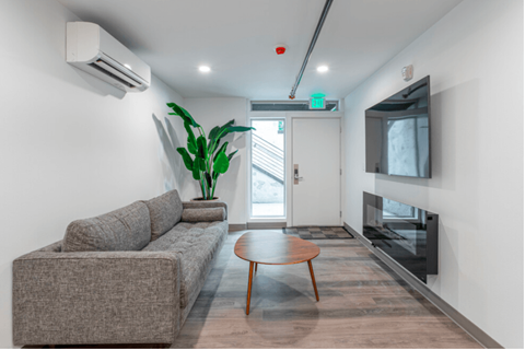 a living room with a couch and a coffee table